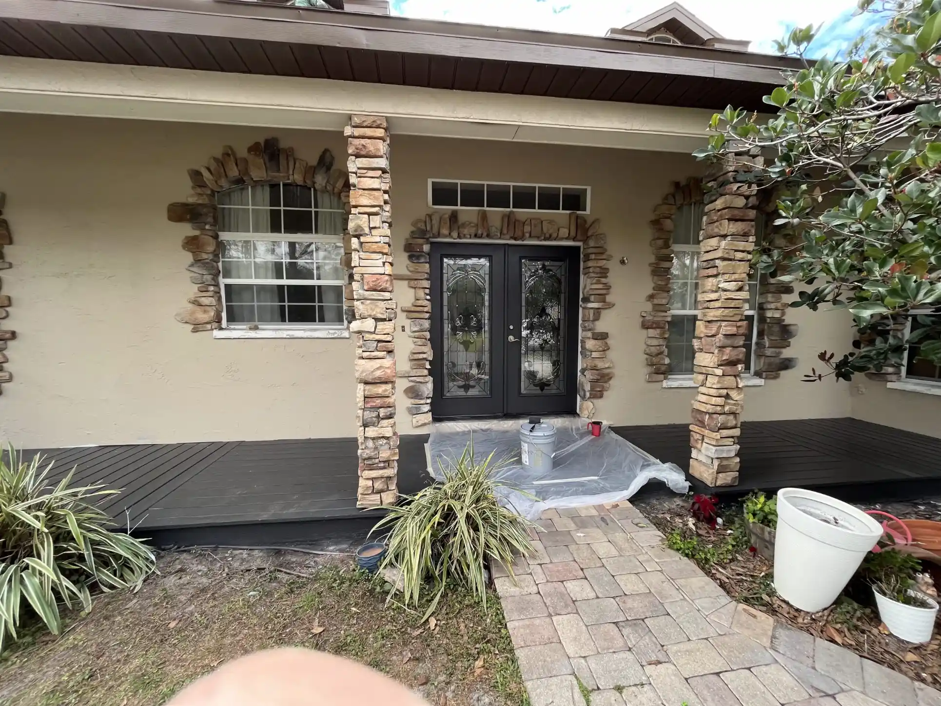 Front entry of a Tampa home featuring beautifully painted exterior details